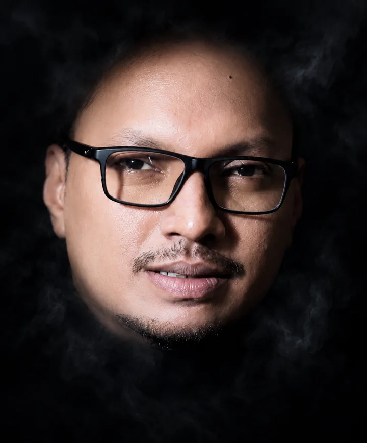 Asifur Rahman, face portrait emerging from dark smoke